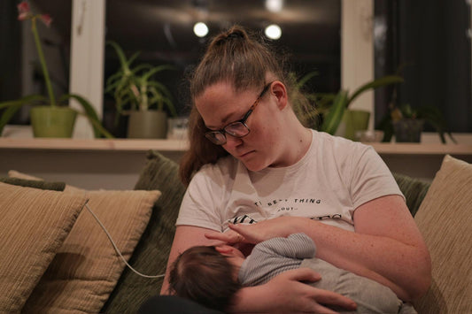 Mother Breast Feeding A Baby